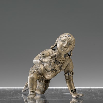 Lot 57 - BABY KRISHNA BRONZE WITH SILVER INLAYS INDIA 18TH CENTURY