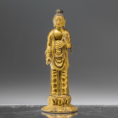 Lot 129 - STANDING GILT BRONZE OF A BUDDHIST ATTENDANT CHINA 18TH CENTURY