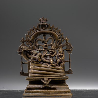 Lot 65 - INDIAN RECLINING BRONZE VISHNU 18TH CENTURY