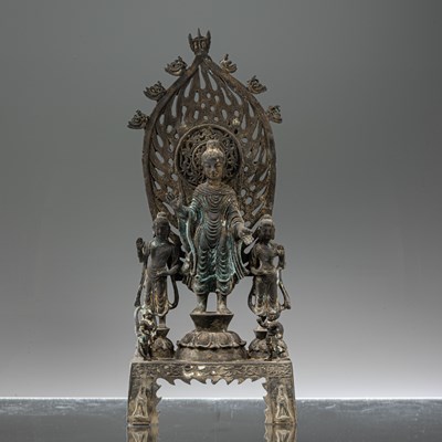 Lot 30 - STANDING TANG STYLE BRONZE GUANYIN FLANKED BY CONSORTS