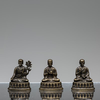 Lot 177 - SET OF THREE SEATED BRONZE LAMAS TIBET 19TH CENTURY