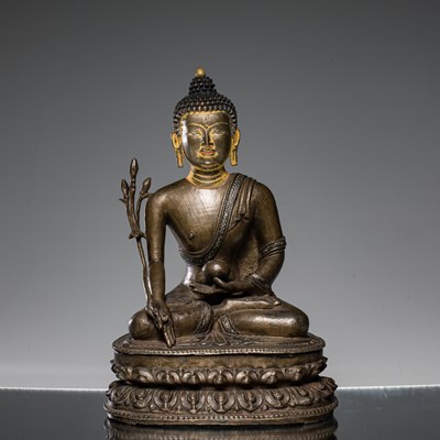 Lot 22 - SEATED MEDICINE BUDDHA BRONZE AND SILVER NEPAL 15TH CENTURY