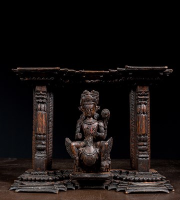 Lot 13 - KARTIKEYA OR KUMARA WITH PEACOCK WOOD 16TH CENTURY NEPAL NEWAR CULTURE IN TORANA
