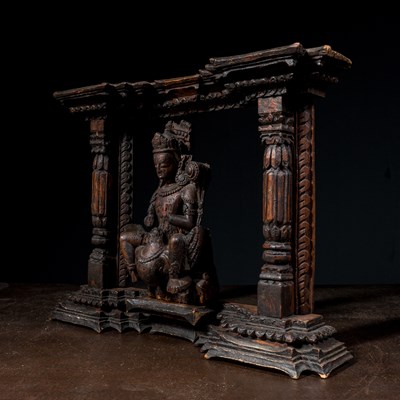 Lot 13 - KARTIKEYA OR KUMARA WITH PEACOCK WOOD 16TH CENTURY NEPAL NEWAR CULTURE IN TORANA
