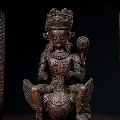 Lot 13 - KARTIKEYA OR KUMARA WITH PEACOCK WOOD 16TH CENTURY NEPAL NEWAR CULTURE IN TORANA