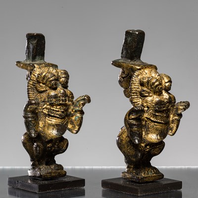 Lot 291 - PAIR OF GILD BRONZE YAKSHAS OR YALIS INDIA 15TH CENTURY