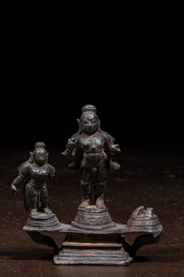 Lot 208 - BRONZE TRIAD OF KRISHNA AND TWO STANDING SCULPTURES INDIA 15TH CENTURY