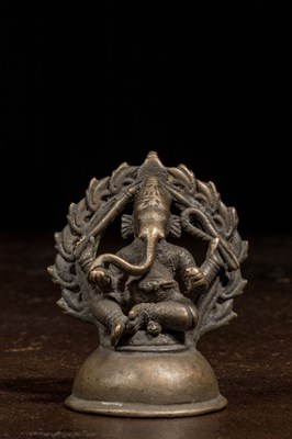 Lot 134 - SEATED BRONZE GANESHA INDIA KERALLA 15TH CENTURY