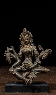 Lot 63 - SEATED BRONZE VASUDHARA NEPAL 16TH CENTURY