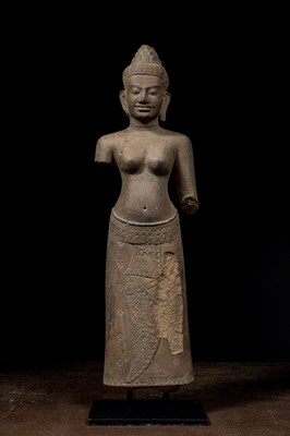 Lot 94 - STANDING SANDSTONE FIGURE OF UMA LATE 12TH TO 13TH CENTURY BAYON