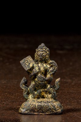 Lot 71 - EARLY EXQUSITE BRONZE SCULPTURE OF A GAU GILT TIBET OR NEPAL 14TH CENTURY
