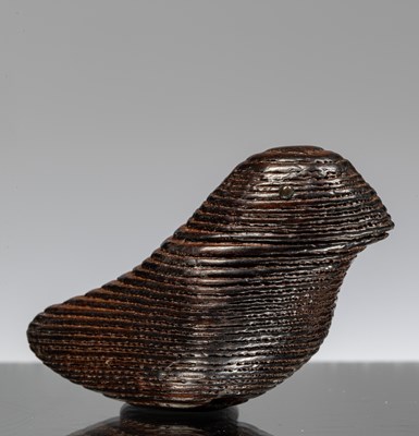 Lot 234 - NETSUKE OF A STYLIZED BIRD