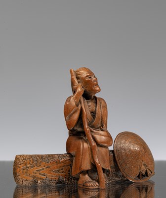 Lot 231 - NETSUKE OF A SEATED PILGIRM