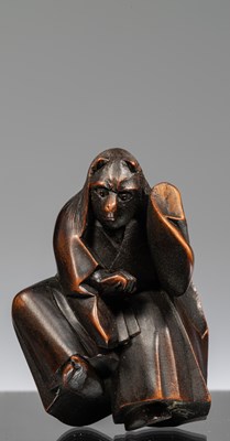 Lot 243 - NETSUKE OF A PERFORMING MONKEY IN A KIMONO