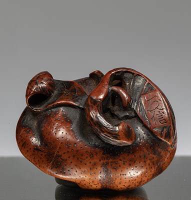 Lot 233 - NETSUKE OF A PERSIMMON
