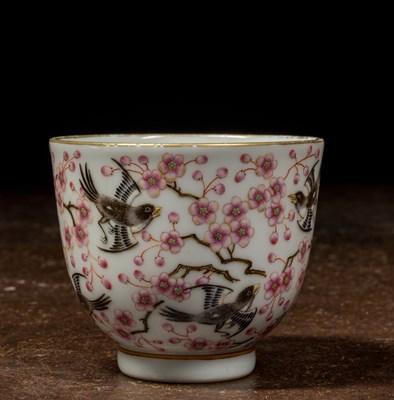 Lot 19 - FAMILIE-ROSE PORCELAIN CUP WITH PLUM BLOSSOMS, QING DYNASTY