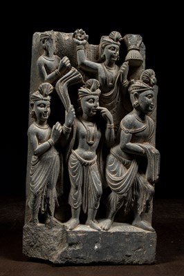 Lot 31 - GREY SCHIST GANDHARA RELIEF DEPICTING CELEBRATORY PROCESSION