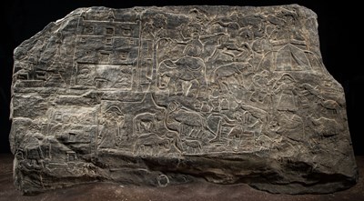 Lot 40 - NARRATIVE STONE CARVING DEPICTING TIBETAN VILLAGE LIFE AND PILGRIMAGE