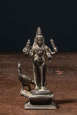 Lot 72 - A BRONZE FIGURE OF KARTIKEYA (SKANDA) WITH HIS VEHICLE PEACOCK INDIA 19TH CENTURY