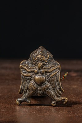 Lot 160 - A BRONZE TOKCHA DEPICTING GARUDA TIBET 12TH -14TH CENTURY