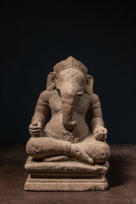 Lot 138 - SEATED STONE GANESHA ANGKOR WAT PERIOD KHMER EMPIRE 12TH CENTURY