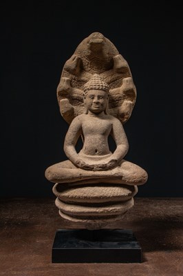 Lot 52 - SANDSTONE NAGA BUDDHA 11TH CENTURY BAPHUAN PERIOD