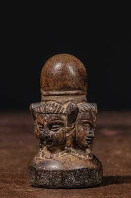 Lot 127 - SMALL CHATAMUKA LINGAM STONE INDIA 12TH CENTURY