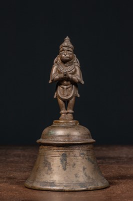 Lot 56 - STANDING BRONZE HANUMAN ON BELL INDIA 16TH CENTURY