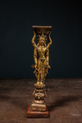 Lot 22 - A GILT-BRONZE DOUBLE-SIDED OFFERING GODDESS FROM A DENSATIL MONASTERY PILLAR TIBET 14TH CENTURY