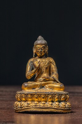 Lot 148 - SEATED GILT BRONZE BUDDHA TIBET 16TH CENTURY