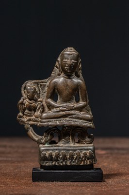 Lot 164 - EARLY BRONZE BUDDHA WITH SILVER EYES ON LOTUS KASHMIR REGION 9TH TO 10TH CENTURY