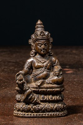 Lot 121 - SEATED STONE JAMBHALA NEPAL 19TH CENTURY OR EARLIER