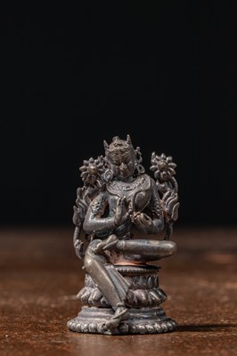 Lot 183 - SEATED SILVER TARA NEPAL 20TH CENTURY OR EARLIER