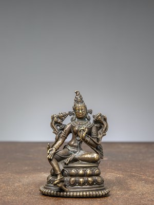 Lot 271 - A SEATED PADMAPANI, BRONZE WITH SILVER AND COPPER, TIBET, 12TH CENTURY