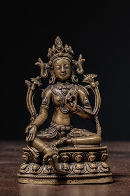 Lot 125 - SETAED BRONZE TARA WITH COPPER AND SILVER INLYAS TIBET 15TH CENTURY