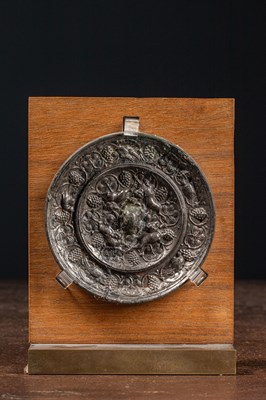 Lot 42 - (R) A BRONZE MIRROR WITH ANIMALS AND GRAPEVINES TANG DYNASTY CHINA 7TH TO 8TH CENTURY