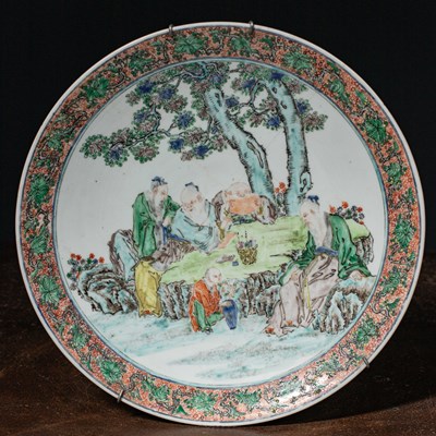 Lot 58 - (R) A LARGE FAMILLE VERTE PORCELAIN DISH WITH SCHOLARS IN A GARDEN QING DYNASTY CHINA 1820 - 1850