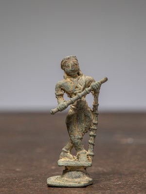 Lot 363 - A BRONZE KRISHNA PLAYING THE FLUTE, INDA, 16TH CENTURY