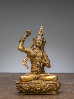 Lot 272 - A TIBETAN GILT BRONZE OF MACHIG LABDRON, 18TH CENTURY, WITH SILVER INLAYS