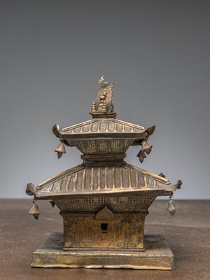Lot 287 - A COPPER REPOUSSE TEMPEL MODEL, NEPAL, 19TH CENTURY