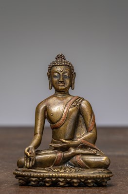 Lot 248 - A SEATED BRONZE BUDDHA WITH SILVER AND COPPER INLAYS, TIBET, 13TH CENTURY