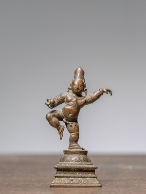 Lot 322 - A DANCING BRONZE KRISHNA, INDIA, 15TH CENTURY