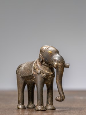 Lot 273 - A STANDING BRONZE ELEPHANT WITH SILVER AND GOLD, NEPAL, 18TH CENTURY