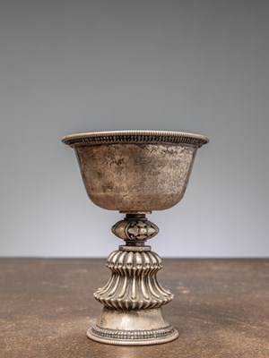 Lot 239 - (R) A SILVER EMBOSSED OFFERING BOWL, TIBET, 19TH CENTURY