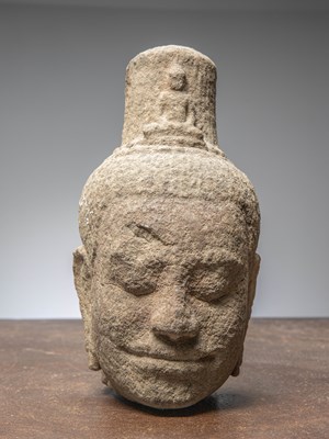 Lot 414 - (R) AN EXQUISITE KHMER SANDSTONE BUDDHIST HEAD, CAMBODIA, 12TH CENTURY