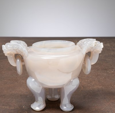 Lot 154 - (R) AN AGATE DING VESSEL, CARVED WITH DRAGON HANDLES, CHINA, ABOUT 1850