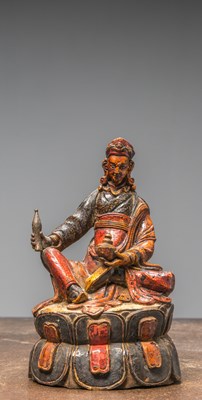 Lot 244 - A RARE WOOD CARVED AND POLYCHROME FIGURE OF PADMASAMBHAVA, TIBET, 18TH CENTURY