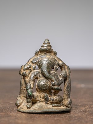 Lot 319 - A SEATED BRONZE GANESHA, INDIA, 16TH CENTURY