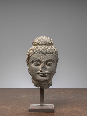 Lot 1 - A GREY SCHIST HEAD OF BUDDHA GANDHARA 4TH CENTURY