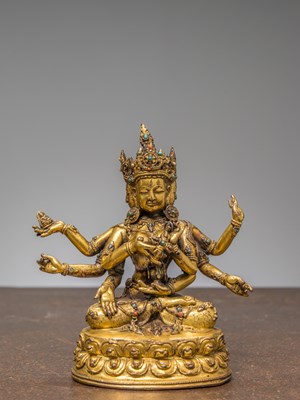 Lot 232 - A BRONZE FIREGILT STATUE OF USHNISHAVIJAYA, TIBET 15TH CENTURY WITH DENSATIL INFLUENCE
